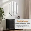 A mirror is displayed on a wall above a dresser, with a plant to the left and curtains to the right. Text overlays describe the mirror's features. Podgląd zdjęcia produktu