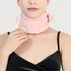 A person wearing a pink neck brace. Produktbild-Vorschau