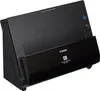 A black Canon imageFORMULA DR-C225II scanner is shown at an angle against a light gray background. Voir les images du produit