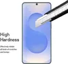 A smartphone screen protector being tested for hardness with a utility knife. Voir les images du produit
