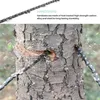 A chainsaw chain cutting into a tree trunk. Náhled obrázku produktu