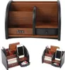 A collage of images showing a wooden desk organizer with compartments and a drawer, and two smaller views of the organizer filled with office supplies and a smartphone. Podgląd zdjęcia produktu
