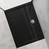 A black shower tray with a silver handle, set against a light gray tiled wall. Voir les images du produit