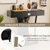 A black console table with drawers and shelves, decorated with coffee-related items and a vase of flowers. The image also includes marketing text and diagrams about its safety features. Náhľad obrázku produktu