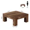 A diagram showing the dimensions of a coffee table, with a silhouette of a person for scale. Voir les images du produit