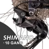 A close-up view of a bicycle's rear derailleur and cassette, with text overlay. Produktbild-Vorschau