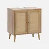 A wooden cabinet with rattan doors and tapered legs. Anteprima dell’immagine prodotto