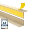 A close-up, angled view of two beige corner profiles, one with yellow adhesive tape being peeled back. Produktbild-Vorschau