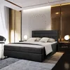 A luxurious bedroom with a large bed, bedside tables, and decorative wall panels. Produktbild-Vorschau