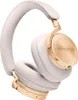 A pair of white and gold over-ear headphones. Produktbild-Vorschau