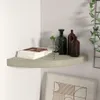 A corner shelf with decorative items. Anteprima dell’immagine prodotto
