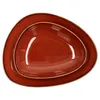 Two brown, irregularly shaped plates stacked on top of each other against a white background. Produktbild-Vorschau