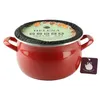 A red enamel pot with a decorative lid and a product tag. Podgląd zdjęcia produktu