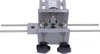 A close-up, studio shot of a metal drilling jig on a white background. Náhled obrázku produktu