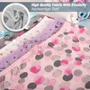 A close-up view of several pairs of girls' panties with different patterns and colors, stacked on top of each other. A circular inset shows a close-up of the fabric. Produktbild-Vorschau