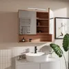 A modern bathroom vanity with a mirror cabinet, sink, and faucet. Produktbild-Vorschau