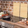 A kitchen scene with a stove, cooking utensils, and ingredients. Náhled obrázku produktu