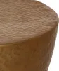 A close-up view of a hammered brass side table. Náhled obrázku produktu