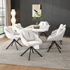 A dining room setting with a marble-topped table and six beige upholstered chairs. Produktbild-Vorschau