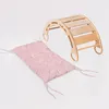 A pink cushion and a wooden climbing arch are displayed on a white background. Náhled obrázku produktu