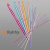 A collection of colorful crochet hooks arranged in a fanned-out pattern against a plain gray background. Produktbild-Vorschau
