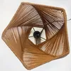 A view from above into a lampshade made of brown rope. Produktbild-Vorschau
