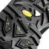 A close-up view of the sole of a black boot, showing its tread pattern and grip elements. Produktbild-Vorschau