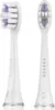 Two white toothbrush heads with purple bristles are shown against a white background. Anteprima dell’immagine prodotto