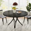 A round dining table with chairs set in a bright room with large windows. Anteprima dell’immagine prodotto