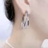 Boucles d'oreilles créoles pour femmes, argentées – Créoles Voir les images du produit 2
