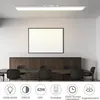 A modern office or meeting room with a long table and chairs, illuminated by a long LED ceiling light. Anteprima dell’immagine prodotto
