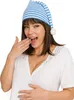 A woman wearing a striped sleeping cap and a white top. Produktbild-Vorschau