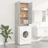 A bathroom scene with a washing machine and a tall cabinet. Produktbild-Vorschau