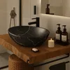 Ceramiczna umywalka owalna nablatowa czarna z żyłkami Podgląd zdjęcia produktu 8