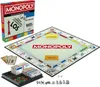 A Monopoly board game set, including the box, board, cards, and game pieces, displayed on a white background. Produktbild-Vorschau