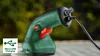 A close-up shot of a Bosch EasyShear Akku-Strauchschere being charged via a micro-USB cable. Anteprima dell’immagine prodotto