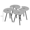 Four nesting tables with curved tops and dark legs, shown from a slightly elevated angle against a white background. Náhled obrázku produktu