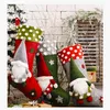 A collection of Christmas stockings with gnome decorations. Náhľad obrázku produktu