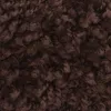 A close-up view of a shaggy, dark brown carpet. Náhled obrázku produktu