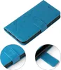 A blue flip cover case for a Samsung Galaxy A36 5G with a floral and butterfly embossed design. Produktbild-Vorschau
