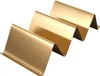 A golden taco holder with three slots. Produktbild-Vorschau