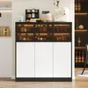 A modern sideboard cabinet with glass doors and LED lighting, showcasing various jars and bottles on shelves, placed in a home setting. Produktbild-Vorschau