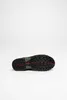 The bottom view of a hiking shoe is shown against a white background. Produktbild-Vorschau