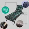 A chaise lounge cushion with a green leaf pattern is shown, with close-up insets highlighting features like ties, fabric texture, and water repellency. A certification logo is also visible. Náhled obrázku produktu