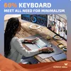 A woman is working at a desk with multiple monitors, using a compact keyboard. Produktbild-Vorschau