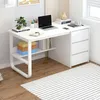 A white desk with a laptop, books, and a plant. Produktbild-Vorschau