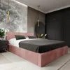 A modern bedroom with a pink upholstered bed, dark wardrobes, and decorative elements. Produktbild-Vorschau