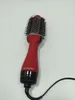 A red and black Revlon hair dryer and volumizer is shown against a white background. Voir les images du produit