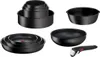 A collection of black cookware items, including pots and pans, arranged on a white background. Voir les images du produit