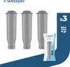 Three water filter cartridges are displayed in front of a dark blue background with a white diagonal stripe. A smaller package containing one cartridge is shown in the foreground. Podgląd zdjęcia produktu